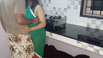 Arab couple enjoys kitchen sex on a stand while others are present in the dining room